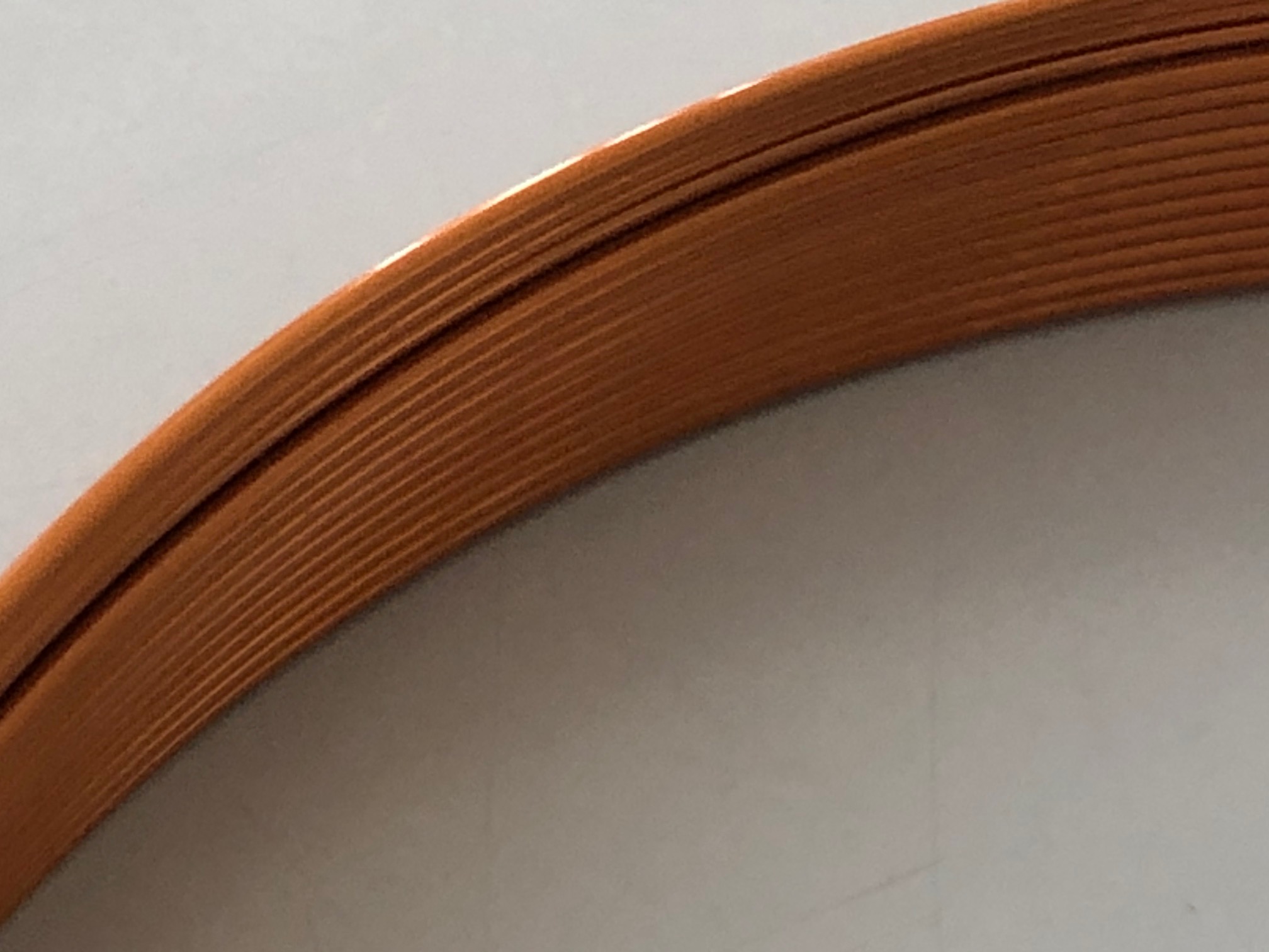 Coil with stepped inner diameter